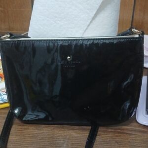 Kate Spade New York Harrison Street Tay Patent Leather Crossbody Bag.